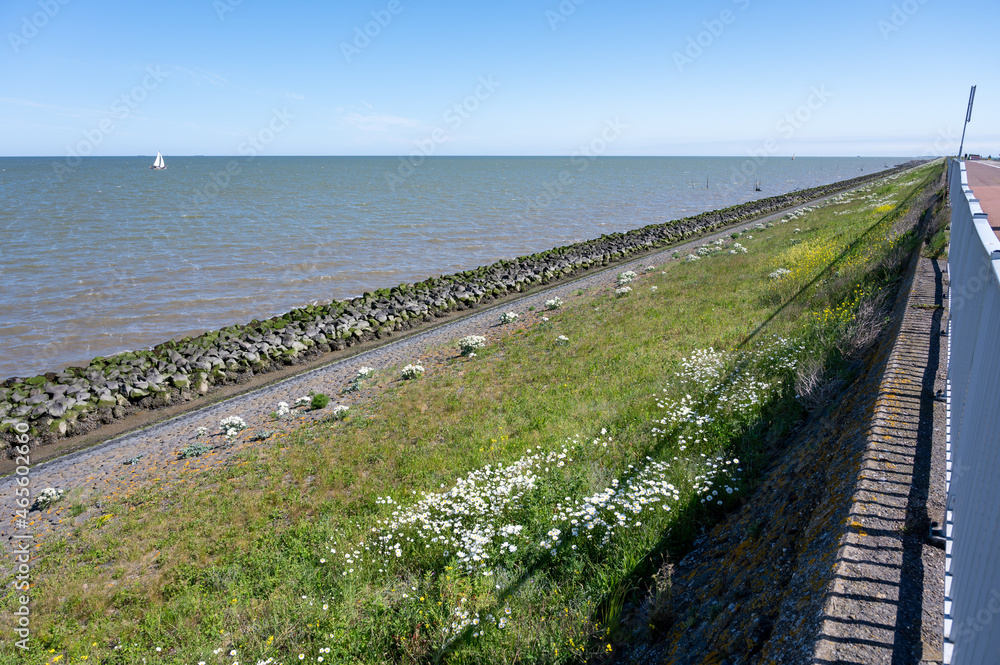 View on Afsluidijk, long dam with freeway for protection of Netherlands from North Sea
