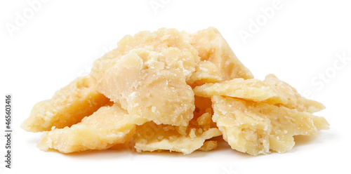 Heap of parmesan cheese on a white background. Isolated