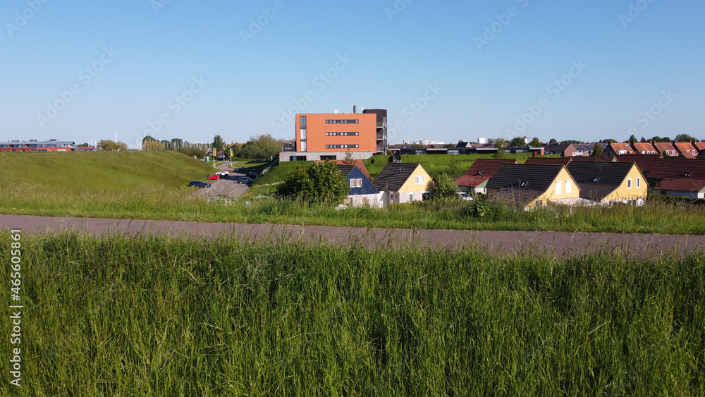 View on houses in Wemeldinge, Zeeland, Netherlands View on houses in Wemeldinge, Zeeland, Netherlands