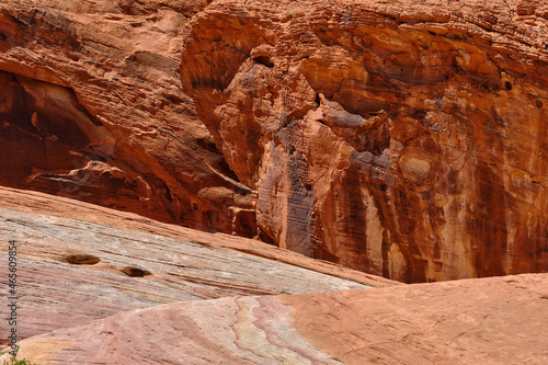 Orange rock faces and pink and white plateaus in the Nevada Desert