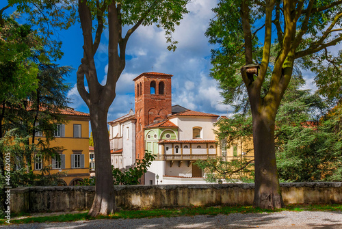 Travelling in Tuscany. The Walls of Lucca public park with San Ponziano (St Pontianus) Church photo