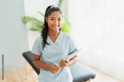Portrait of young black woman physiotherapist on a physio center