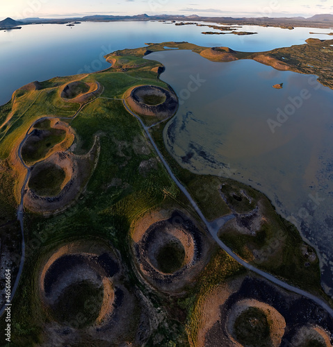 pseudo craters during sunset at lake myvatn photo