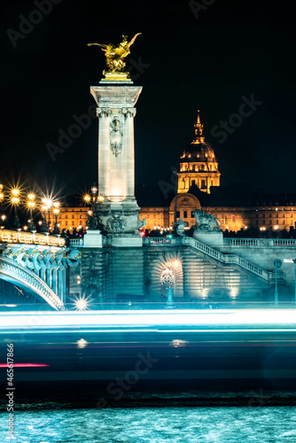 Vertical shot of the Esplanade des Invalides in Paris, France at night photo