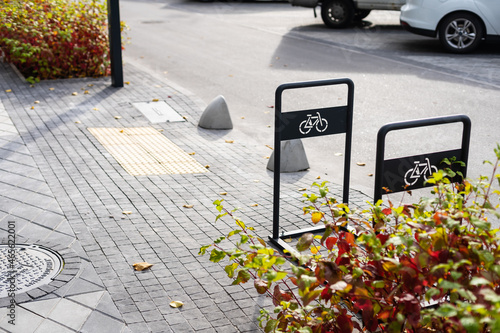 empty small bike parking near the road