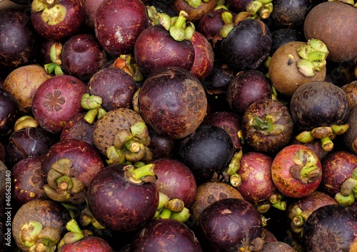 close-up of fresh ripe mangosteen fruits background
