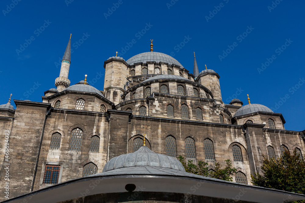 The New Mosque or Yeni Cami located on the Golden Horn embankment in the Eminonu district of Istanbul, Turkey. It is one of the best-known sights of Istanbul.