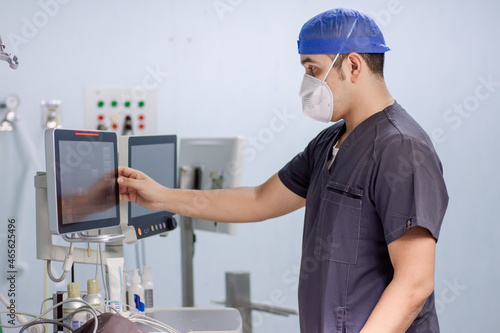 young adult doctor preparing for surgery