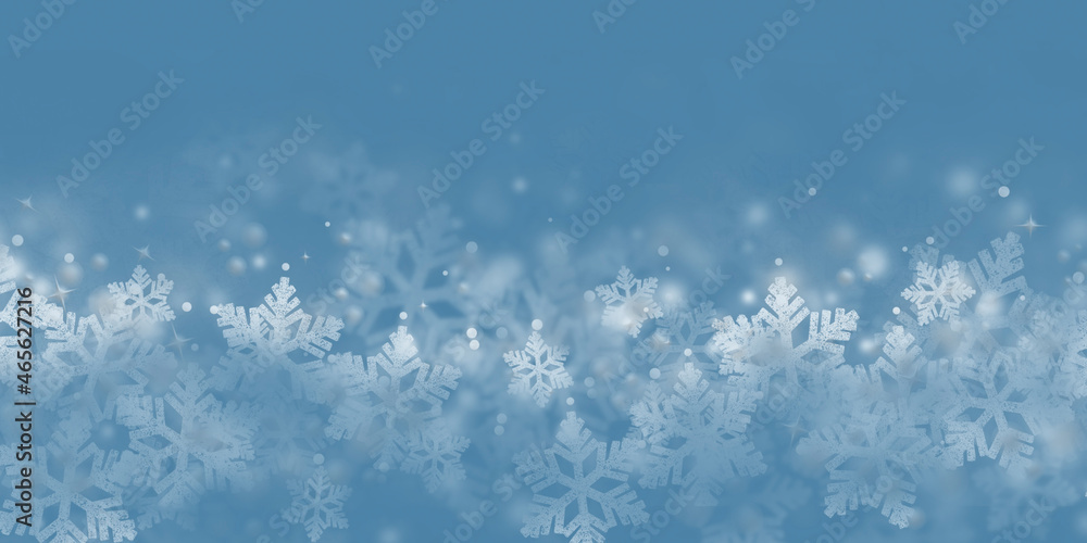 Winter Snowfall and snowflakes blue background. Cold winter Christmas and New Year background.