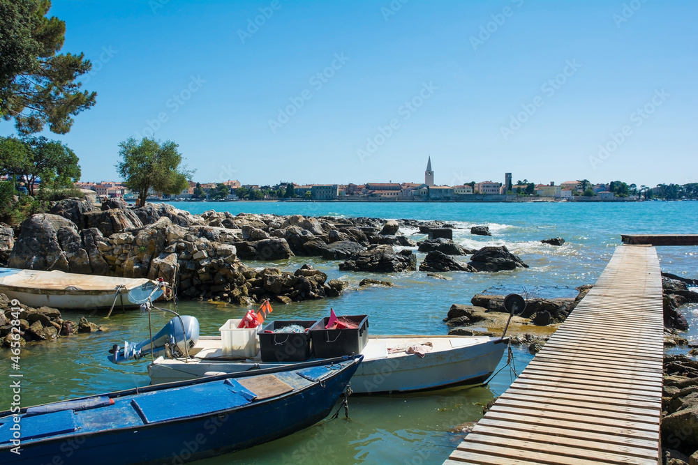 Boats moored north of the historical centre of Porec in Istria in western Croatia
