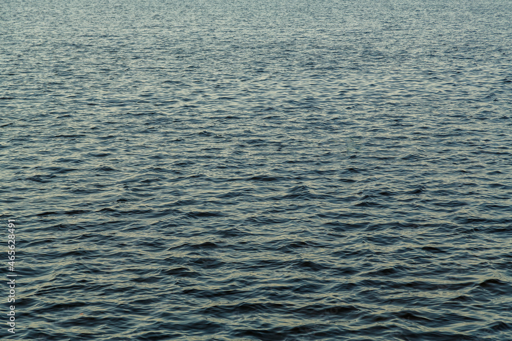 Obraz premium Water surface without waves on the river texture.