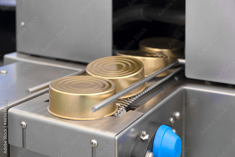 Canned food production. Modern automatic food preservation production line Canned food production. Modern automatic food preservation production line