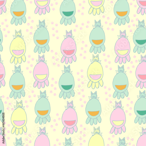 baby painted cats and footprints vector seamless pattern. Background in pastel colors for the nursery, baby products and fabrics