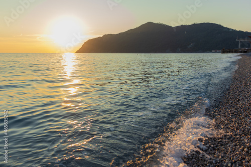 Sunset in Riva Trigoso, Italy, one of the bezt-known tourist destinations on the Italian Riviera. High angle view. Copy space. photo