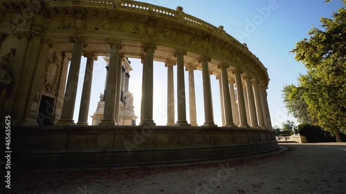 Parque del Retiro, Madrid, Spain. Alfonso XII monument, sunlight through columns. High quality 4k footage