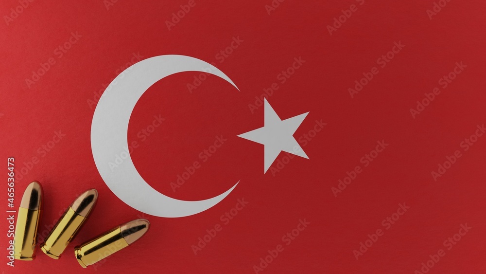 Obraz premium Three 9mm bullets in the bottom left corner on top of the national flag of Turkey