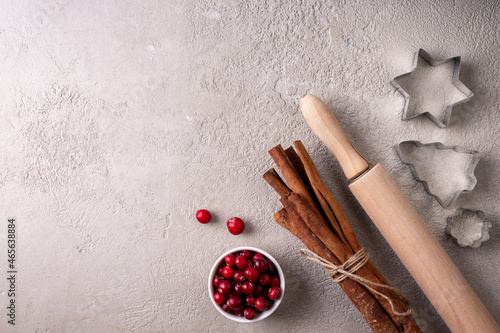 cinnamon, cranberries, and Christmas cookie cutters