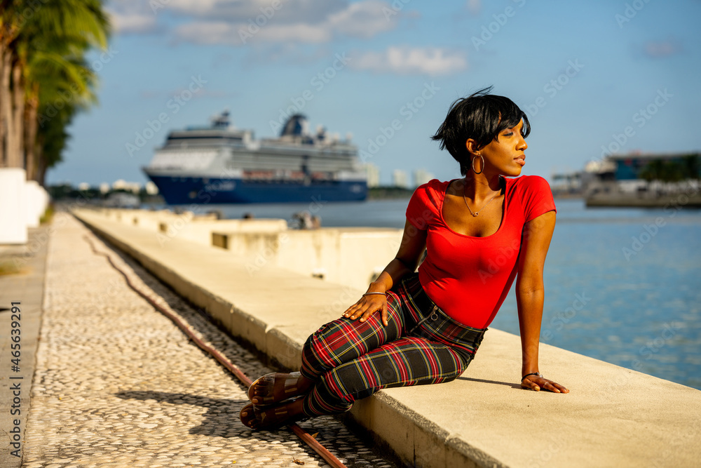Woman posing by Downtown Port of Miami