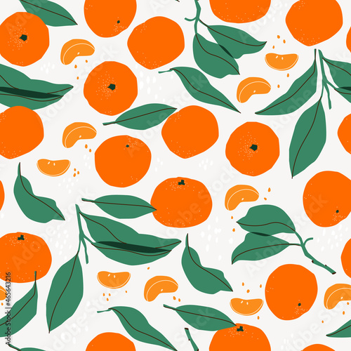 Vector seamless pattern with mandarin fruits, slices and leaves. Hand drawing tangerine background. For design, print, textile, paper. photo
