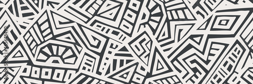 Unique Geometric Vector Seamless Pattern made in ethnic style. Aztec textile print. African traditional design. Creative boho pattern. Perfect for site backgrounds, wrapping paper and fabric design.
