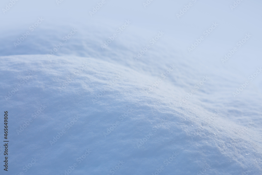 Fresh snow texture background in blue tone and sunlight. Fresh snow texture background in blue tone and sunlight.