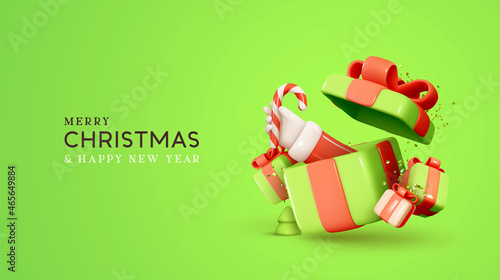 Christmas and New Year gift boxes, with an open surprise box Santa's hand gives candy cane. Falling green present and gold confetti. Festive Xmas background. Realistic 3d Design Vector illustration