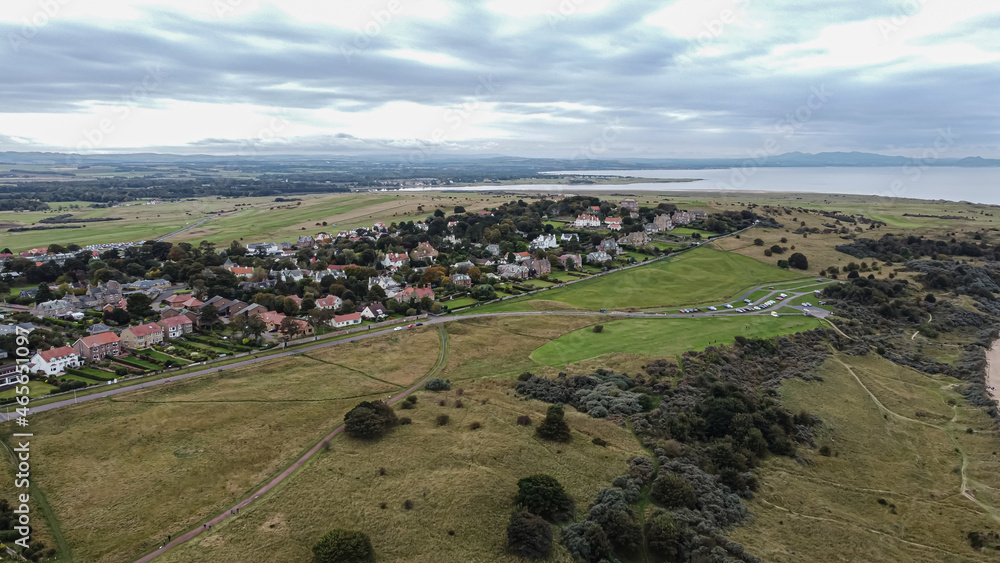 Fototapeta premium Town Gullane and seascape view from a sky. East Lothian, Scotland