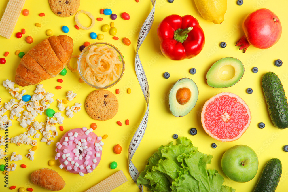 healthy foods and unhealthy foods on a colored background close-up top view. healthy foods and unhealthy foods on a colored background close-up top view.