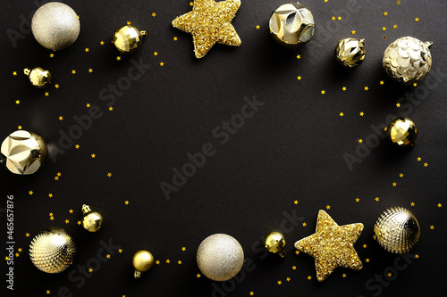 Elegant Dark Christmas background with golden balls  stars  confetti. Luxury Christmas card template.