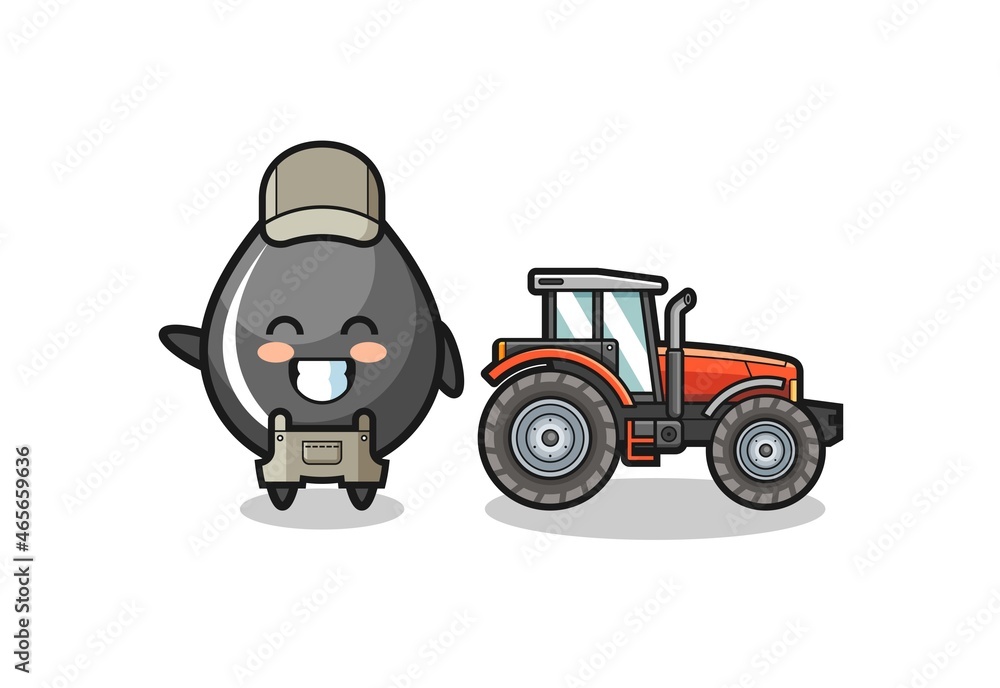 the oil drop farmer mascot standing beside a tractor the oil drop farmer mascot standing beside a tractor