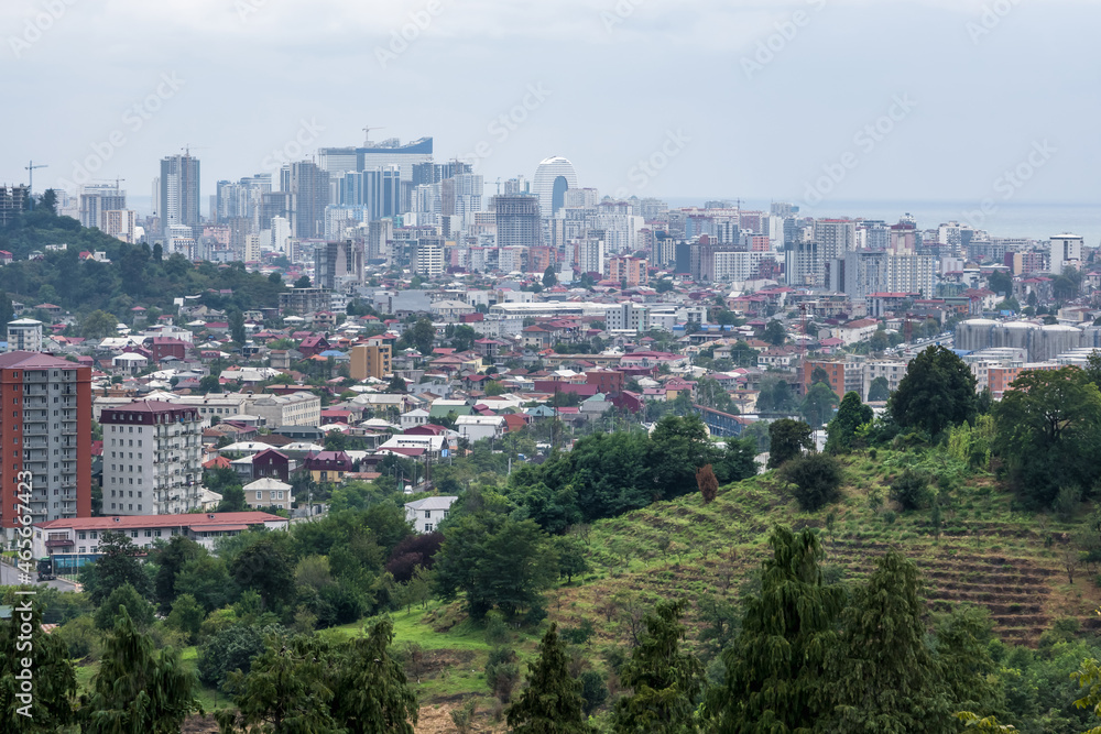 ariel panoramic view of old city and skyscrapers with the sea from the mountains ariel panoramic view of old city and skyscrapers with the sea from the mountains