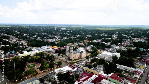 Aerial orbital shot of the entire town of Valladolid in Mexico photo