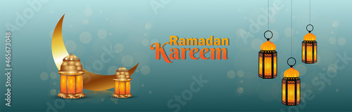 Creative banner of ramadan kareem with golden lantern