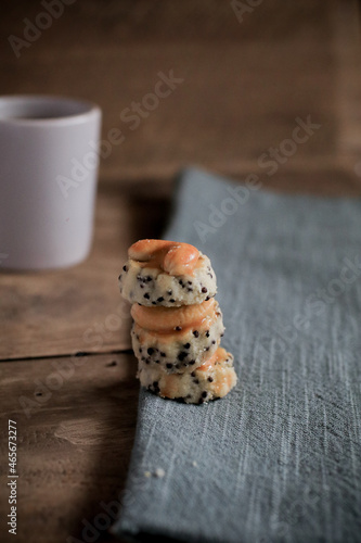 Canvas Print Asian cookies singapore or cashew Cookies with coffee on cozy background