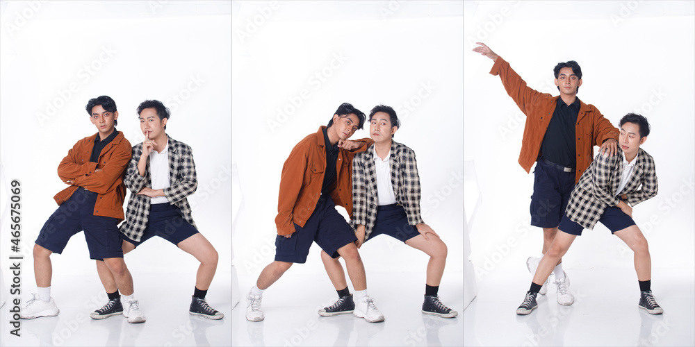 Fototapeta premium Full length of 20s Asian tanned skin men black hair hold together as Gay LGBT, wear shirt pants