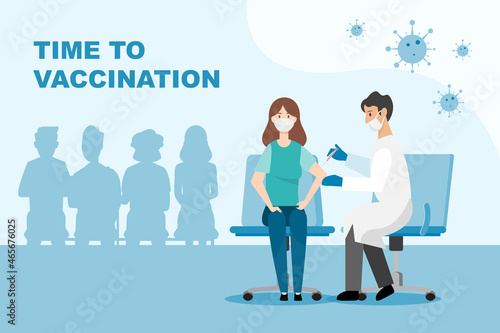 Doctor makes an injection vaccine to woman
