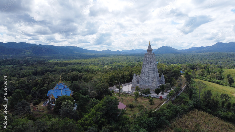 Top view from drone of Bodh Gaya Pagoda in the temple resembles Bodh Gaya in India. It is a place of worship for Buddhist people. , thailand Top view from drone of Bodh Gaya Pagoda in the temple resembles Bodh Gaya in India. It is a place of worship for Buddhist people. , thailand