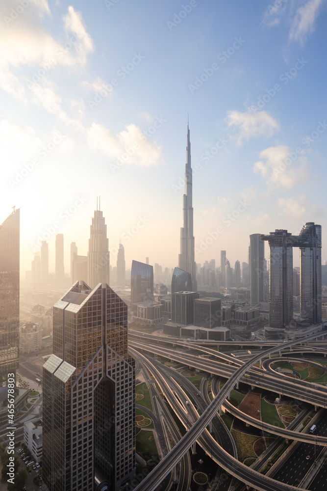 Naklejka premium City Skyline and cityscape at sunrise in Dubai. UAE