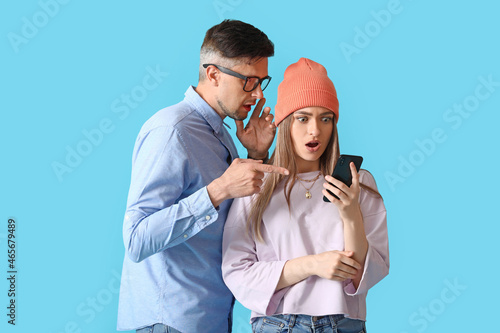 Gossiping people with phone...
