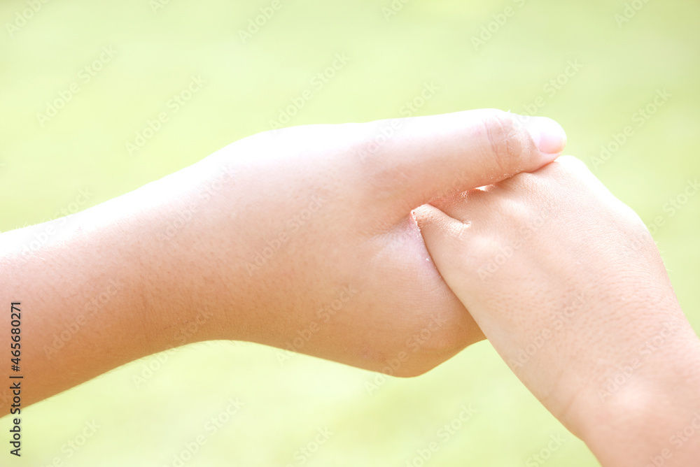 Close up of holding hands. Close up of holding hands.