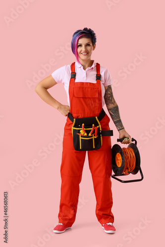 Female electrician with too...