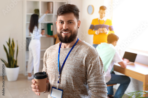 Handsome man having coffee ...