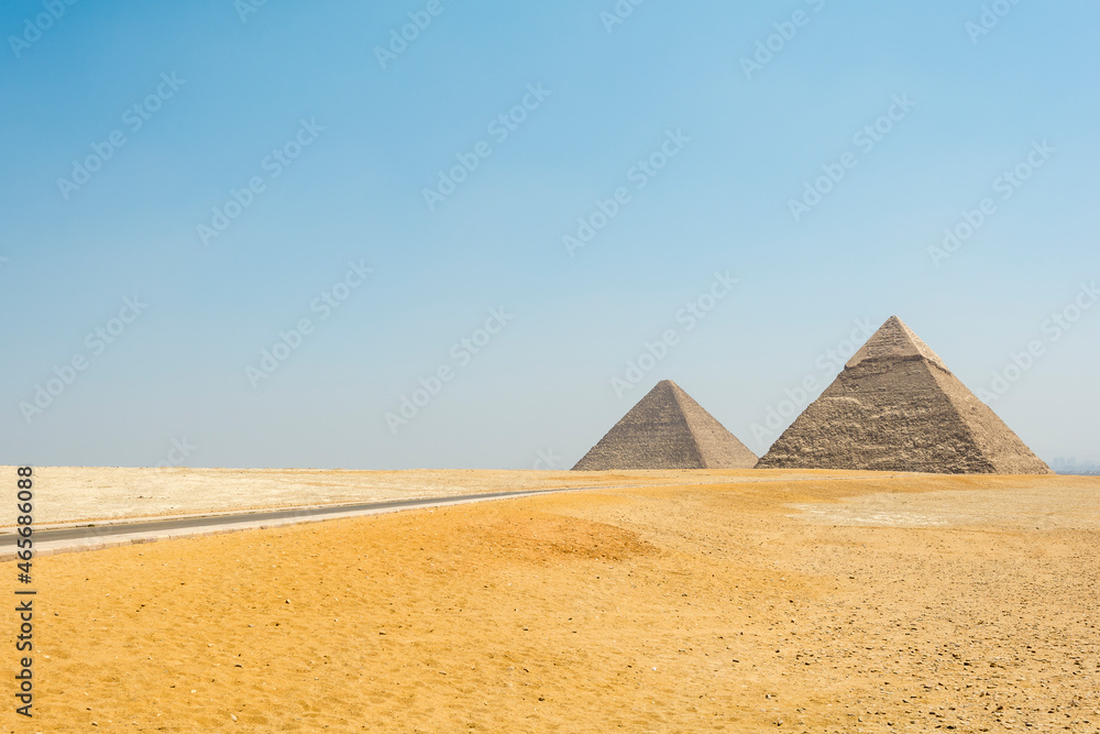 The Great Pyramid also known as Cheops pyramid or Khufu and the pyramid of Khafre or Chefren at Giza pyramid complex, Egypt The Great Pyramid also known as Cheops pyramid or Khufu and the pyramid of Khafre or Chefren at Giza pyramid complex, Egypt