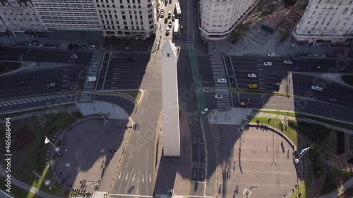 Aerial orbit shot of famous Obelisco De Buenos Aires surrounded by busy roads. Buenos Aires,Argentina. 4K Shot photo