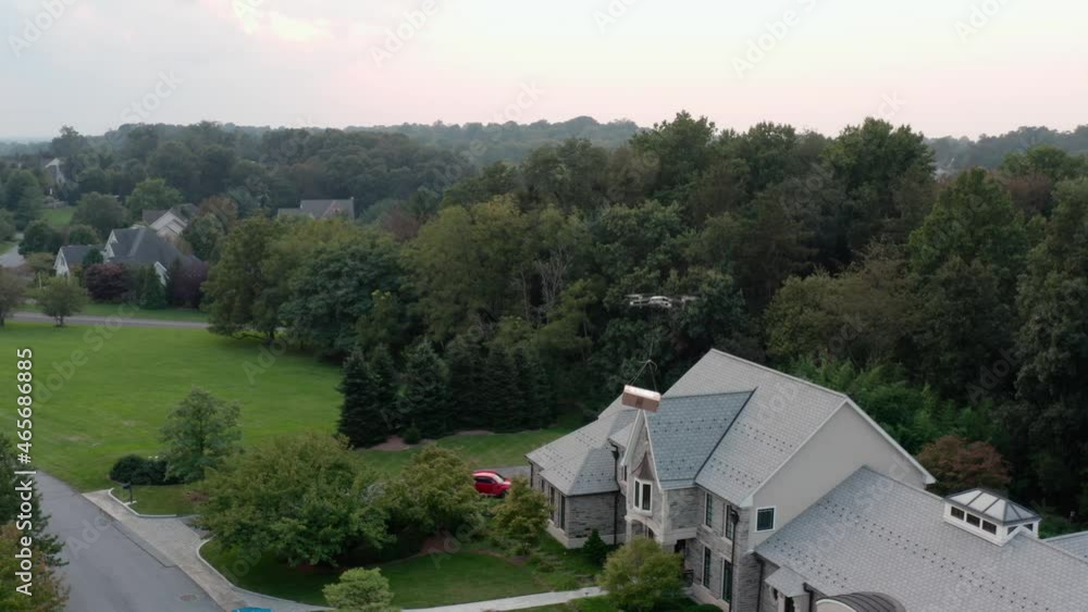 Aerial of drone package delivery to home in USA. Technology for final mile shipments. Aerial of drone package delivery to home in USA. Technology for final mile shipments.