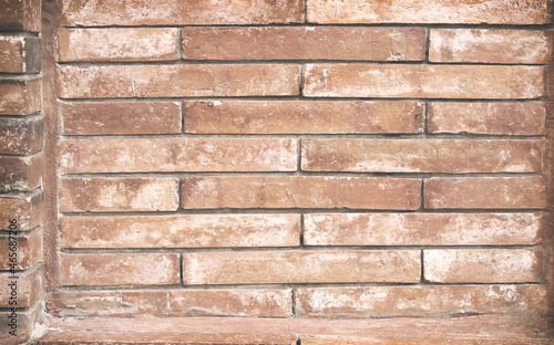 Vintage brick wall with seamless patterns for brown background