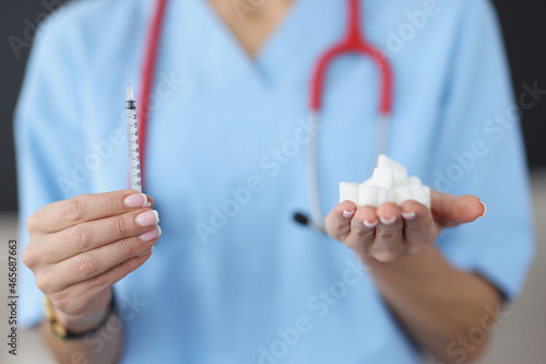 Insulin syringe and refined sugar