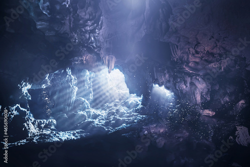 The sunlight shines into the underwater cave.