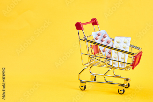 drug trolleys service delivery shopping pharmacy yellow background
