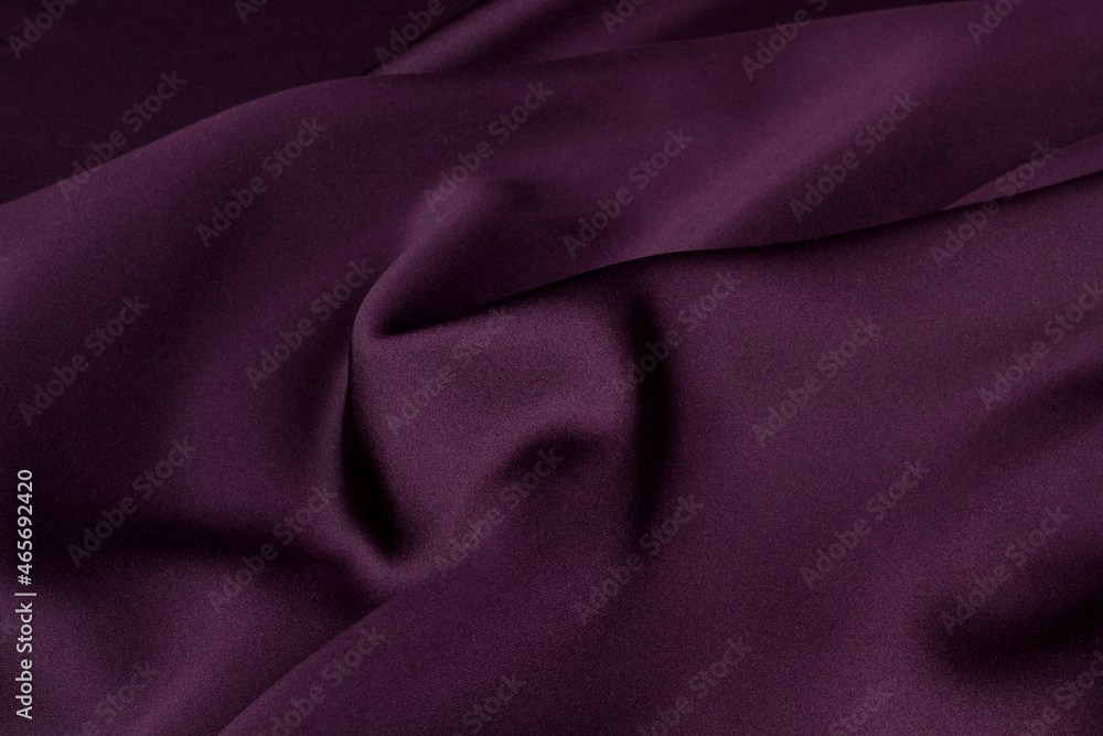 Fototapeta premium Texture of the fabric swirling in a whirlpool. cloth background. Web article template. Long header banner format. Sale coupon. Visit card. Your information. Text space.